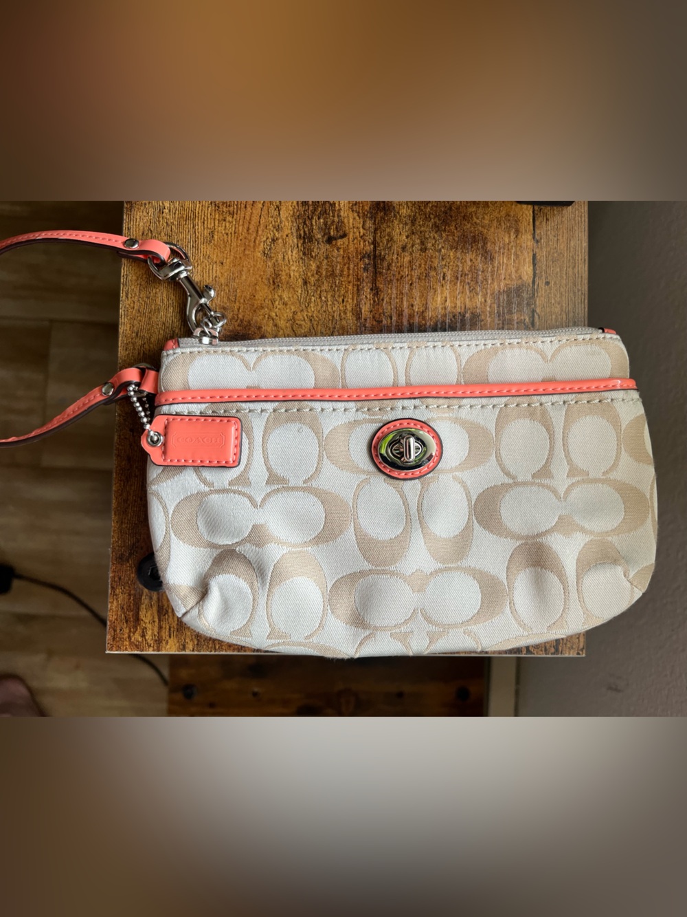 Coach Beige Signature Canvas Wristlet with Coral Trim with Origional Bag Tag